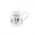 Kids Christmas eve hot chocolate mug with snowy village scene and text