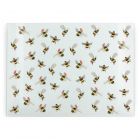 large glass worktop saver with a novelty Christmas bee print