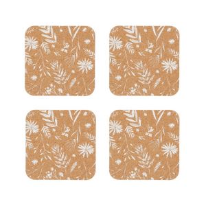 Set of four natural cork coasters featuring a white flowers print design.