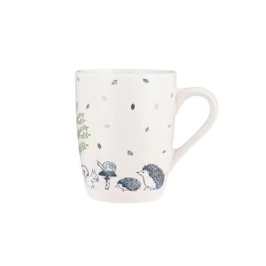 a cream stoneware mug with a navy blue woodland creatures design